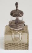 Edward VII hallmarked silver cut glass inkwell, the lid formed as a tilting container, height 9cm,
