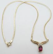 A 9ct gold necklace set with an oval synthetic ruby and diamonds, 5.