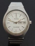 Timex gentleman's wristwatch with day and date aperture, luminous hands, two-tone baton markers,