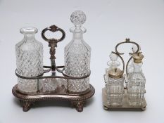 A 19thC or early 20thC silver plated bottle stand with hobnail cut decanters,