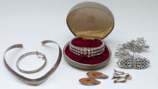 A silver brooch in the form of a dove holding a 14k gold branch, Charles Horner silver bangle,