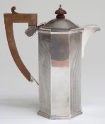 Geroge V hallmarked silver Art Deco hot water jug of octagonal form with engine turned decoration,