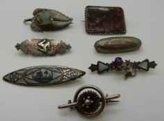 Victorian brooches including thistle,