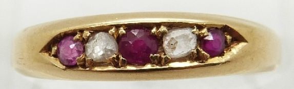 An 18ct gold ring set with diamonds and rubies,