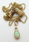 A 9ct gold pendant set with an opal