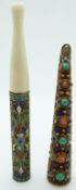 A bone and cloisonné cheroot holder and a filigree brooch set with enamel and cabochons