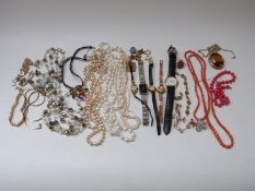 A collection of costume jewellery including mother-of-pearl brooch, Swarovski necklace,