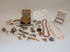 A collection of costume jewellery including Victorian brooches, locket, cameo brooch,