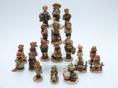 A group of 20 Goebel Hummell figures