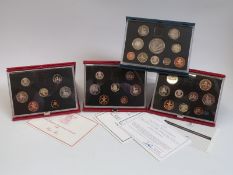 Royal Mint UK proof coin sets, 1987 through to 1989, and a 1998 set,