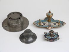 Enamel standish, cloisonné blotter and two pewter inkwells,