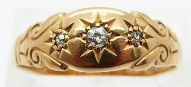 Edwardian 18ct gold ring set with three diamonds in a star setting, Chester 1908,