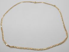 An 18ct gold necklace made up of oval links, 9.