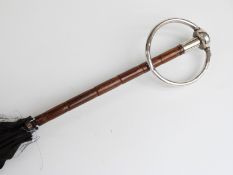 Victorian/Edwardian parasol with hallmarked silver swivelling loop handle,