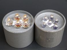 Set of eleven Swarovski Crystal cut glass card holders, largest 5.