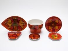 Six Poole Pottery Delphis pattern plates and a jardiniere,