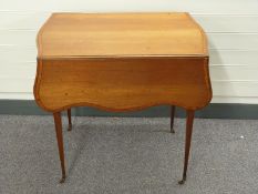 A 19thC mahogany drop leaf Pembroke table with satinwood beading, single drawer,