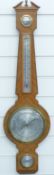 A 20thC aneroid barometer in Edwardian style by O Comitti & Son, silvered dial,