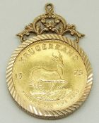A 1975 Krugerrand in 9ct gold textured mount,