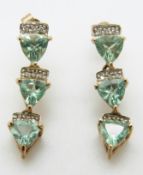 A pair of 9ct gold earrings set with apatite and diamonds, 3.