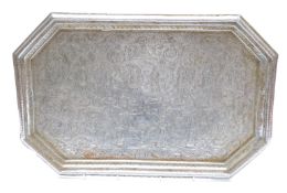 An Indian plated tray decorated with dancing figures,