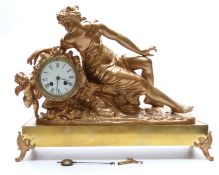 French 19thC gilt metal ormolu style figural mantel clock featuring a reclining lady with cherub