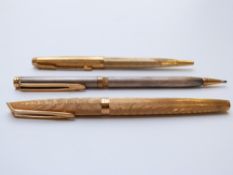 Waterman Moire gold plated fountain pen with 18k gold nib together with a Waterman propelling