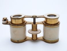 A pair of 19thC G & C Dixey ivory and gilt metal opera glasses marked 'Opticians to His Majesty,