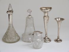 Two hallmarked silver mounted cut glass scent bottles,