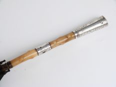 Victorian parasol with hallmarked silver handle, Birmingham 1888, maker HI,