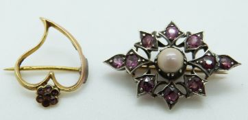 Victorian brooch set with pink paste and a pearl to the centre and a yellow metal heart shaped