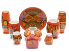 Nine Poole Pottery Delphis pattern vases,