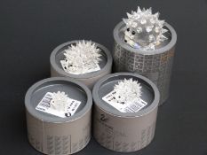 Four Swarovski Crystal Hedgehogs, largest 6cm tall,