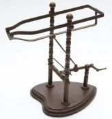 Novelty mechanical brass wine pourer.