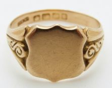 An 18ct gold signet ring with vacant cartouche, size V/W, 7.