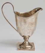Hallmarked silver helmet shaped pedestal cream jug, Birmingham but date rubbed, maker Henry Moreton,