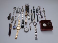 Twenty one gentleman's watches comprising nineteen wrist and two pocket examples including Smiths,