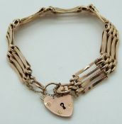 A 9ct rose gold gate bracelet, 13.