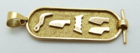 A yellow metal Egyptian gold pendant, 2.
