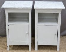 Pair of painted bedside cabinets with marble tops,