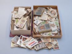 A quantity of loose cigarette cards including Player's Morris's etc