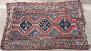 Persian Koliai style rug with three octagonal guls, the central most featuring stylized fish,