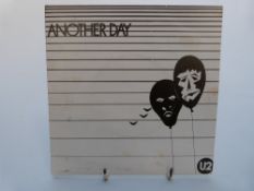 U2 - Another Day (CBS8306) Irish issue orange CBS label.
