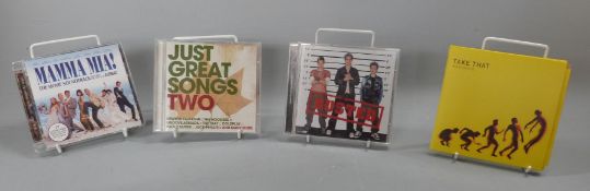 A flight case of mixed CDs