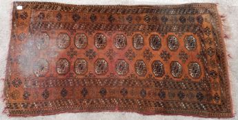 Turkoman Bokhara rug with eighteen octagoonal guls surrounded by geometric borders,