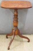 19thC possibly fruitwood tilt top table raised on a tripod base,