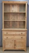 Pine bookcase or housekeeper's cupboard, the top with open shelves,