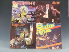 Approximately 20 LPs and picture discs mostly rock including Marillion, ACDC, Status Quo,