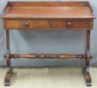 19thC mahogany two drawer side table or desk with shaped supports united by a turned stretcher,