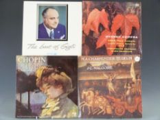 Large collection of classical music vinyl records.